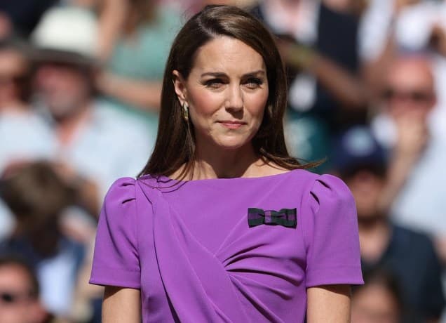 kate middleton puts foot down with king charles universal: a photo of kate middleton in a purple dress