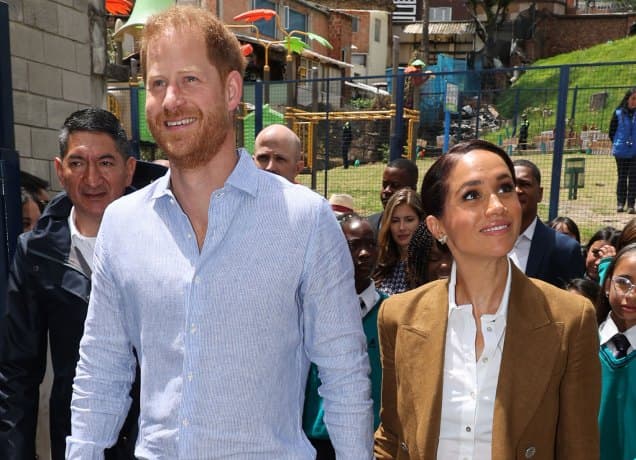 smiling meghan markle and prince harry in colombia