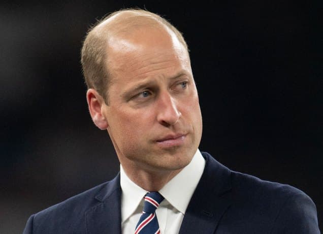 sad prince william in suit