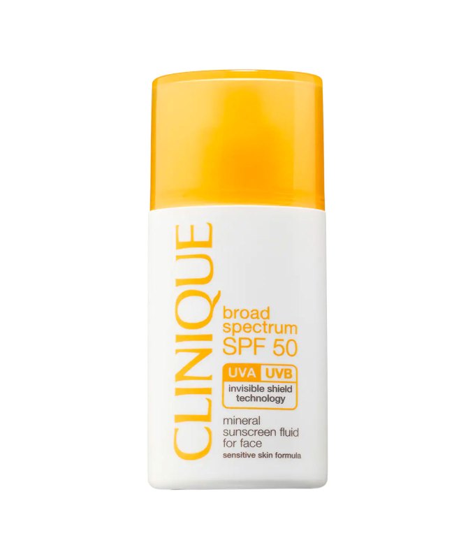 10 Products for Sensitive Skin - A cylindrical tube of Clinique sunscreen. It has the words 'Clinique' written in yellow font. It also has a matching yellow cap. This product is on a white background.