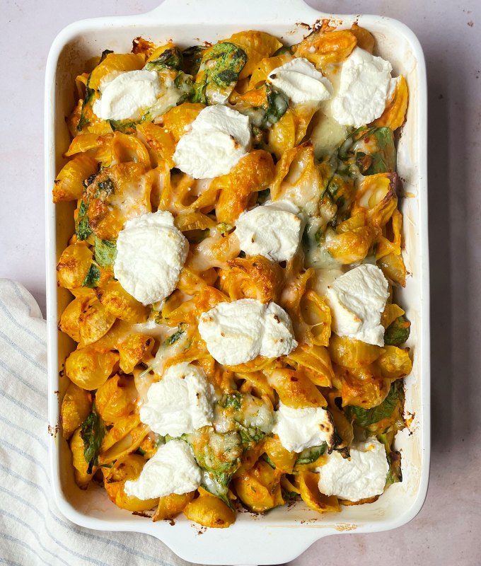 big batch dishes for a crowd: casserole dish of pumpkin pasta with ricotta and spinach