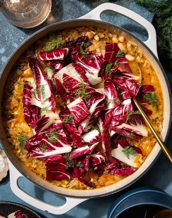 big batch dishes for a crowd: pot of white bean stew topped with marinated radicchio