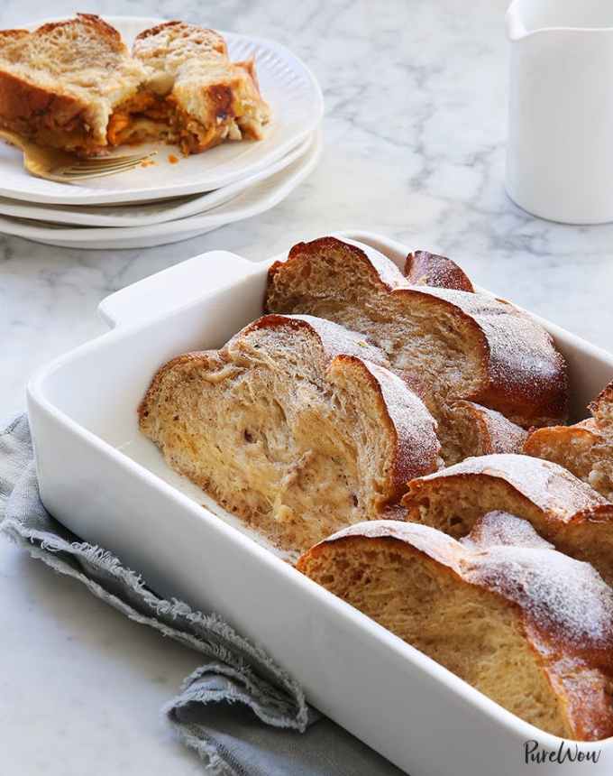 best big-batch recipes: pumpkin pie french toast in a baking dish, with a plate of french toast behind it