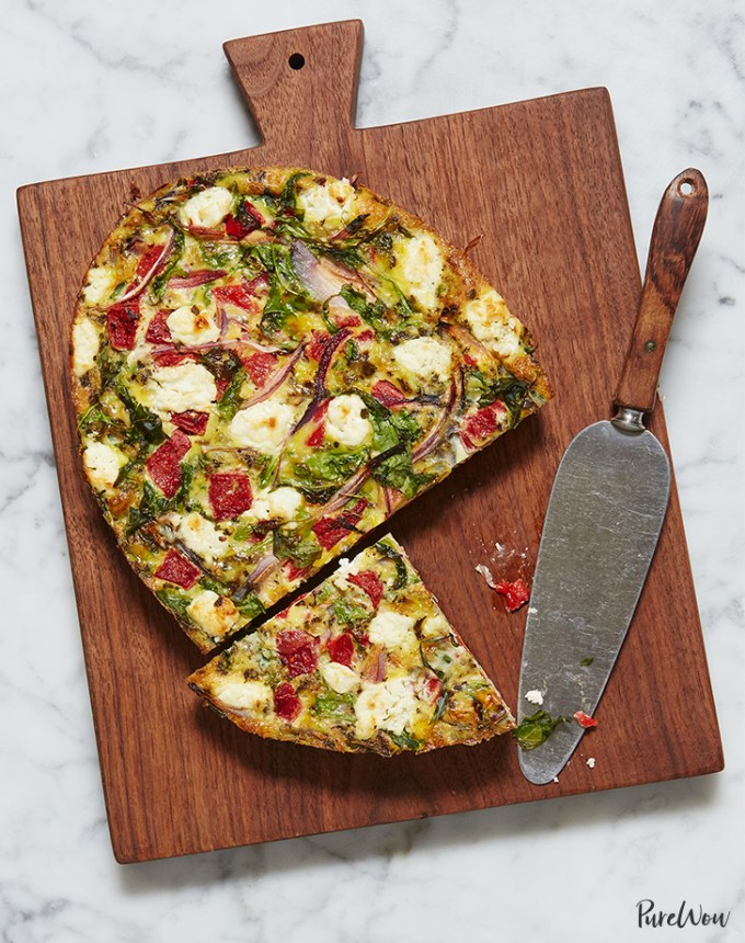 best big-batch recipes: slow-cooker mediterranean frittata on a cutting board with a knife