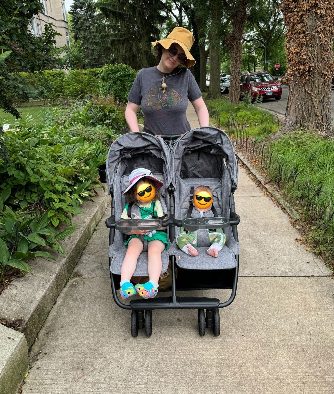 A family with a Disney-approved Zoe Twin v2 stroller.