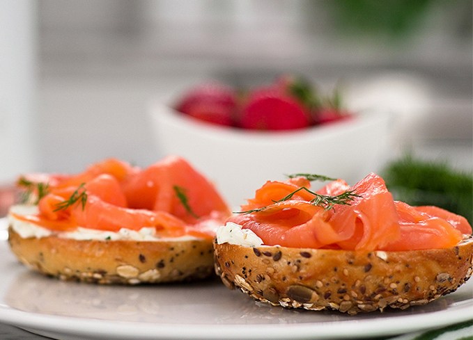 easy lunch ideas: a halved bagel topped with scallion dill cream cheese and lox