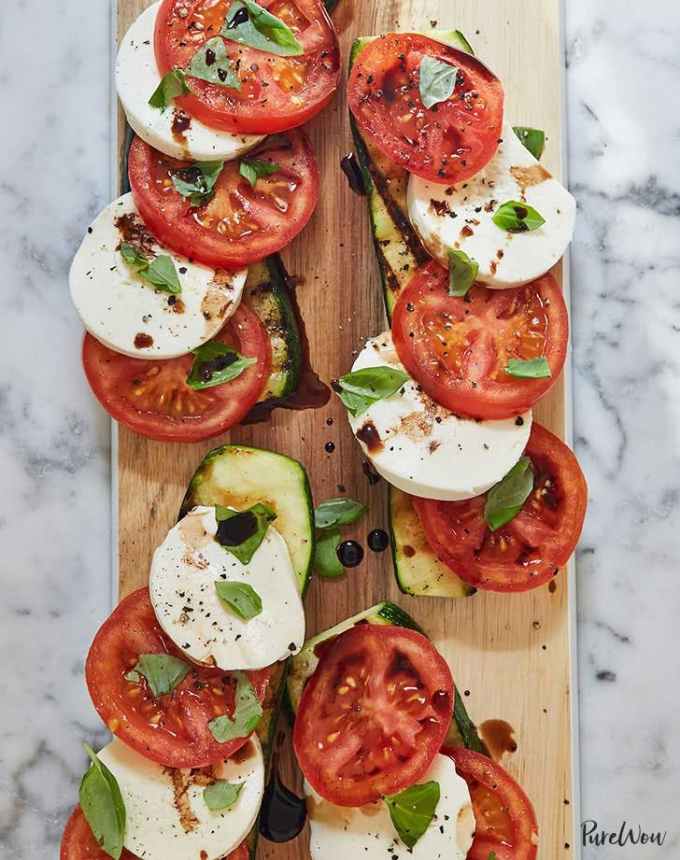 easy lunch ideas: cutting board with grilled zucchini caprese salads