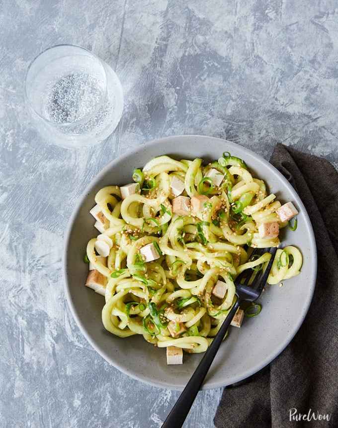 easy lunch ideas: plate of cold sesame cucumber noodles with a fork