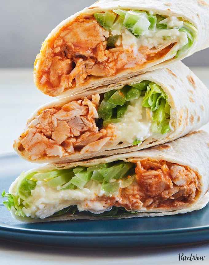 easy lunch ideas: stack of three buffalo chicken wraps with blue cheese and lettuce