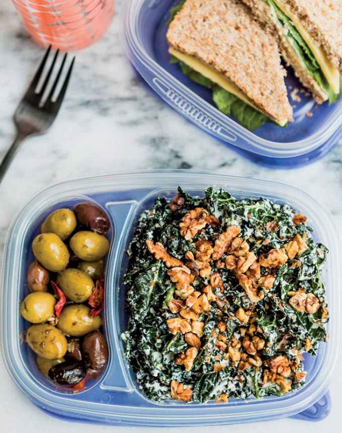 easy lunch ideas: meal prep creamy kale caesar salad in a lunch container