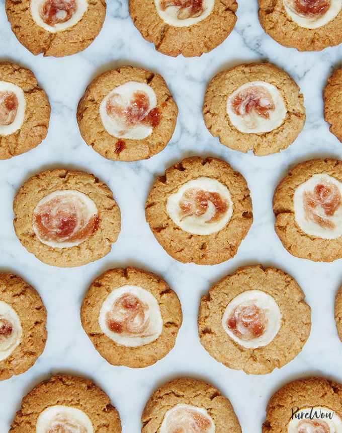 fun things to bake: thumbprint cheesecake cookies on a marble counter