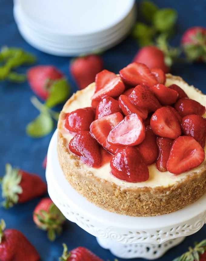 best big-batch recipes: aerial view of a cheesecake topped with strawberries