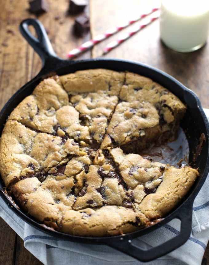 best big-batch recipes: deep-dish skillet chocolate chip cookie with a slice missing