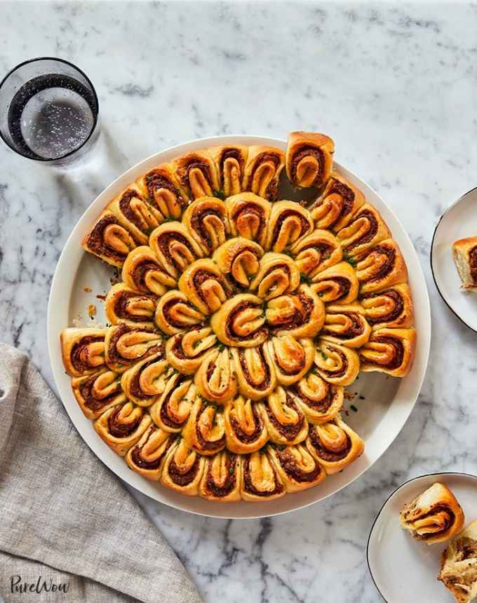 best big-batch recipes: pull-apart bread with caramelized onion filling on a plate