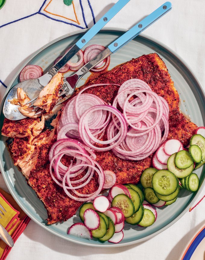 slow-roasted shawarma-spiced salmon recipe: slow roasted shawarma-spiced salmon topped with red onions