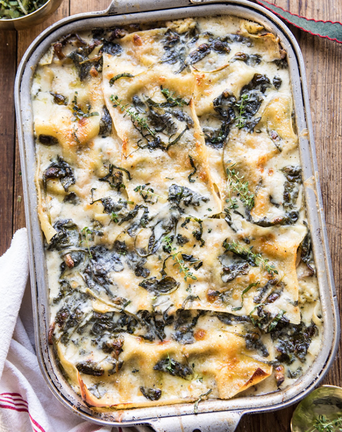 best big-batch recipes: white pesto spinach lasagna in a glass baking dish