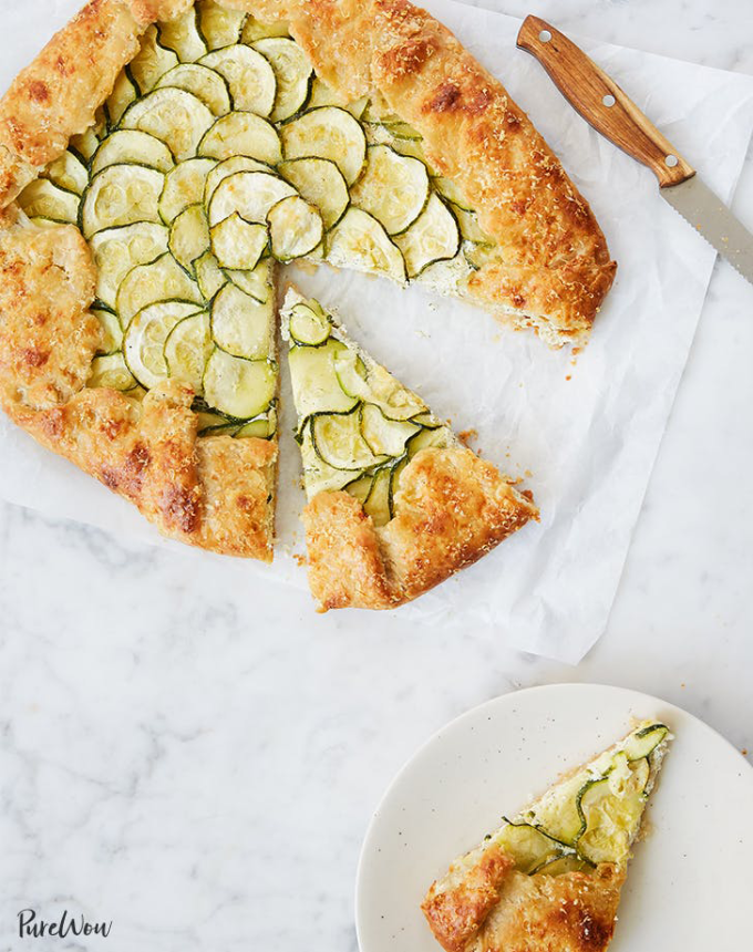 best big-batch recipes: zucchini ricotta galette with a slice missing, on a plate